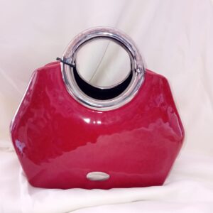 Vaso decorativo scultura  a forma di una borsa in ceramica rossa/argento 25x21