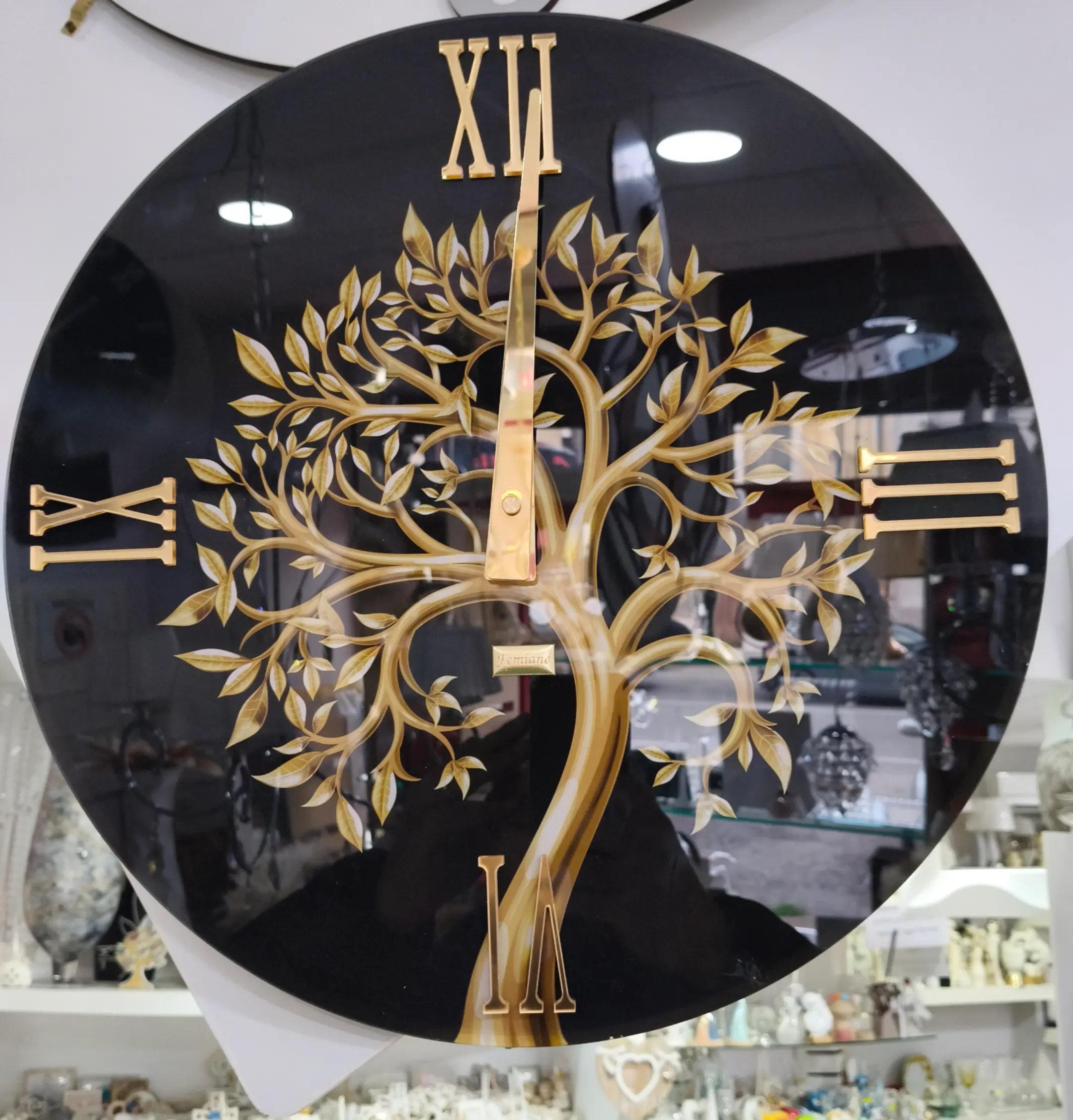 Orologio moderno albero vita nero e oro