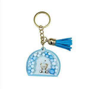 Bomboniera orsetto con palloncini celeste a portachiavi